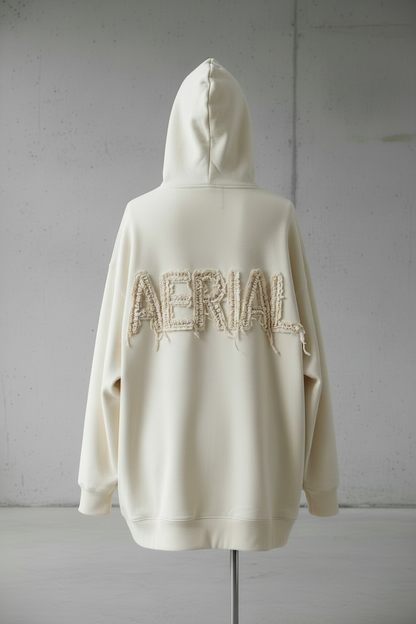 Back view of Aerial hoodie with scruffy ruffled AERIAL logo
